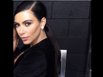 Kim Kardashian Called Mean For Cropping Out North, Clarifies