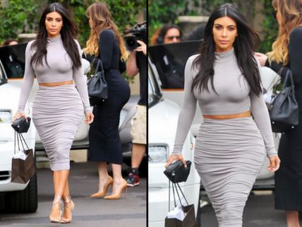 Kim Kardashian Goes Braless, Shows Off Abs