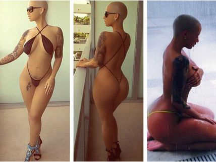 Amber Rose Shares Racy Pics, Goes Topless