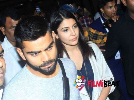 Pics: Virat Kohli & Anushka Sharma Snapped At The International Airport