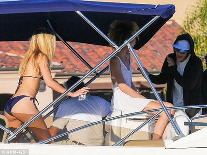 Justin Bieber Sails In Yacht With Bikini Clad Friends