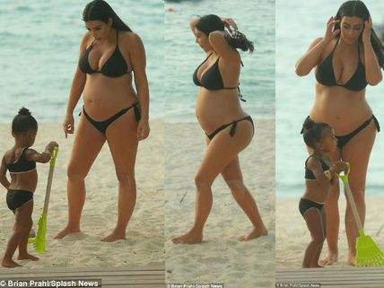 Pregnant Kim Kardashian West Dons Bikini For Beach Fun With North
