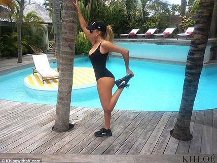 NSFW: Khloe Kardashian's Bootylicious Workout Pics Shared On Her Website
