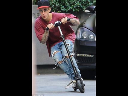 Justin Bieber's Serious Mood Swings : Cancels Shows & Rides On Electric Scooter!