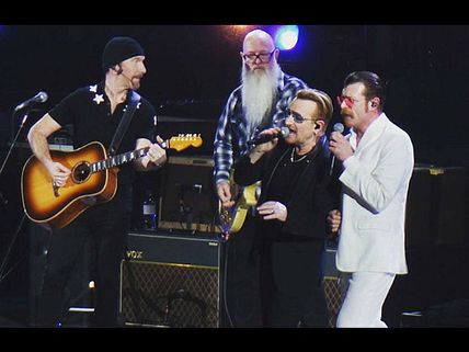 Eagles Of Death Metal Return To Paris After The Deadly Attack, Join U2 On Stage