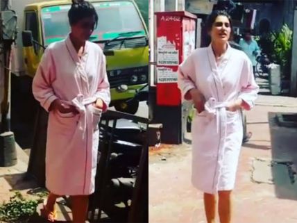 Onlookers Stunned: Nargis Fakhri Wears A Bathrobe & Walks Around Mumbai City!