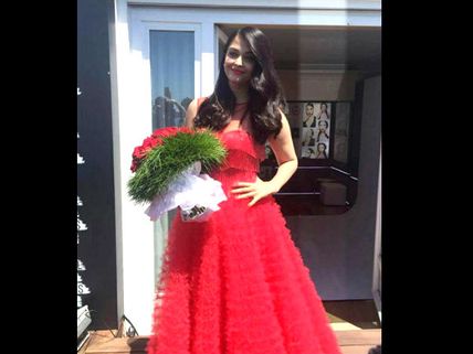  Candid Pictures: Aishwarya Rai Bachchan Makes Heads Turn In Her Red Gown At Cannes 2016