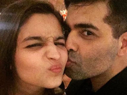 Alia Bhatt Hugs & Kisses Karan Johar's New Family Member!