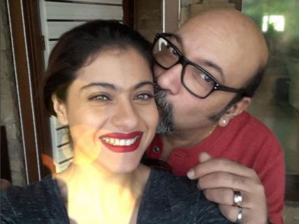Look! This Man Is Kissing Kajol On The Cheeks & It's Not Ajay Devgn