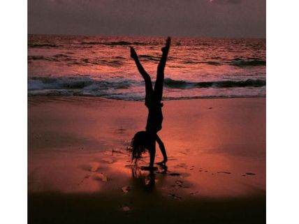 Holy Moly! Lisa Haydon’s Beach Flip Will Give You Severe Fitness Goals