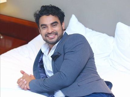 Tovino Thomas's Bilingual Movie: The Title & Poster Revealed!