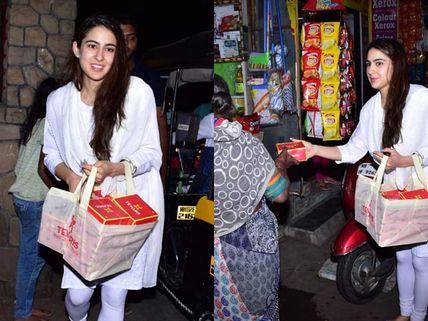 Sara Ali Khan Distributes Sweets Outside Temple; Mum Amrita Singh Accompanies Her