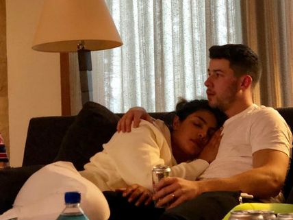 Priyanka Chopra Sleeps On Nick Jonas' Shoulder; Netizens Troll Her & Ask 'Who's Clicking This Pic?'