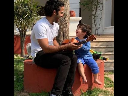 Taimur Ali Khan Soaks In Some Sun & Plays Unkulele; His Video Is The Cutest Thing On The Internet!