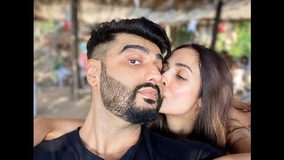 Malaika Arora Welcomes 2020 With A Kiss On Arjun Kapoor’s Cheek: Picture