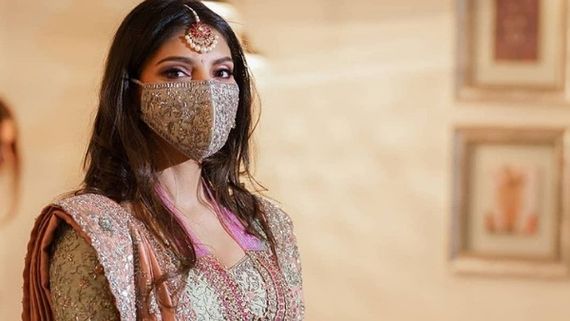 Miheeka Bajaj’s Lehenga With Matching Mask From The Pre-Wedding Event Kicks It Up A Notch