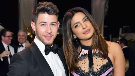 Here's Why 'Free Nick Jonas' Is Trending On Twitter; Fans Ask Priyanka Chopra To Get Off His Back