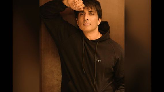 Sonu Sood Asks A Fan Not To Touch His Feet, Lets Her Tie Rakhi On His Hand