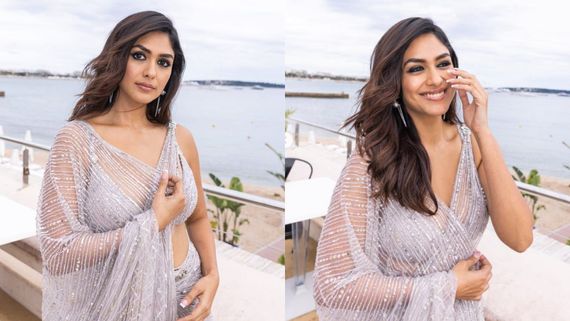 Cannes 2023: Mrunal Thakur Embodies ‘Desi Girl' Avatar In Low Neckline Bralette, Shimmery Saree Gown 