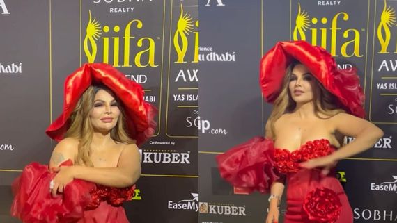 Laal Chilli Sauce Kaha...: OOPS! Rakhi Sawant TROLLED As Her Red Velvet Dress SLIPS At IIFA 2023 Green Carpet