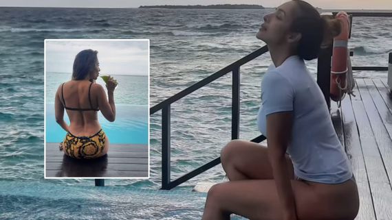 At 50, Malaika Arora Raises Temperature In Sultry Bikini; Netizens React As She Flaunts Her Lower Back Tattoo 