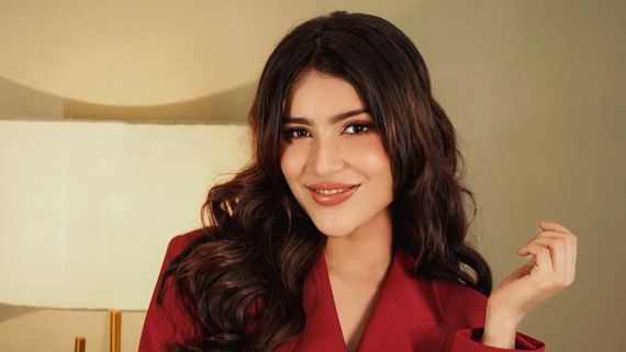 Rapper Khanzaadi Stuns in Red One-Piece Coat, Continues to Shine with Her New Projects