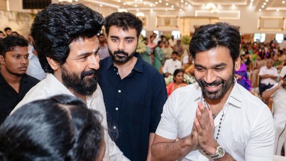 Dhanush Manager's Remarks At Idli Kadai Audio Launch Spark Debate; Netizens See Sivakarthikeyan Reference