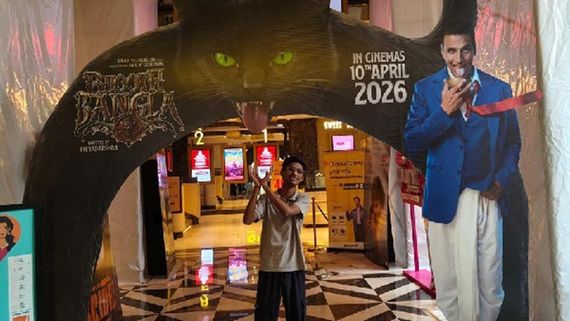 Excited Theatre Audience Pose Next To Bhooth Bangla Posters And Standees, The Reaction Is Next Level