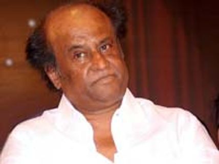 ரஜினி வீட்டுக்கே போய் விருது வழங்கிய விஜய் டிவி!