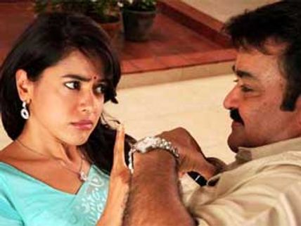 தமிழ் பேச வரும் மோகன்லால் - சமீரா படம்