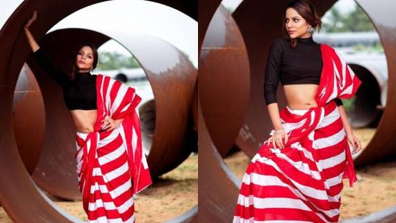 சிகப்பு சேலையில் சிக்குன்னு போட்டோஷூட் நடத்திய  ஐஸ்வர்யா தத்தா!