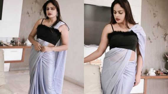 சேலையை உல்டாவாக கட்டி வித்தியாசமாக போஸ் கொடுத்த நந்திதா 