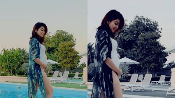 நீச்சல் குளத்தில்.. வயிற்றில் குழந்தையுடன் கவர்ச்சி போஸ் கொடுத்த பிரபல நடிகை.. கண்டித்த ரசிகர்கள்! 