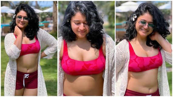   Poonam Bajwa: கையை கழுத்துல வச்சி.. குட்டி டவுசரில் கவர்ச்சி விருந்துவைத்த பூனம் பஜ்வா!