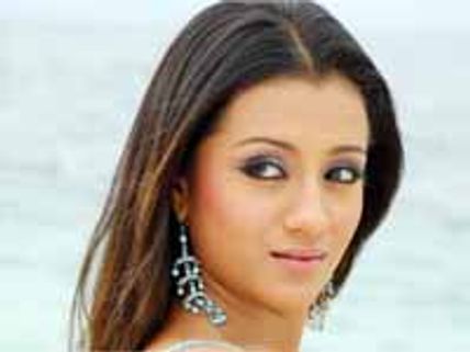 ఆయన ప్రక్కన కూర్చోవటమే అదృష్టం: త్రిష
