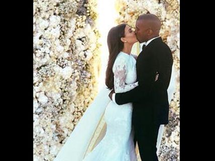 హాట్ బ్యూటీ వివాహం, భర్తను ముద్దాడింది (ఫోటోలు)