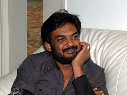 పూరి...స్టోరీ వివాదం: 1 లక్ష మాత్రమే ఇచ్చాడట
