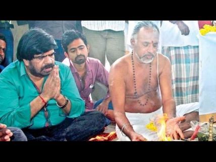 బూతు పాట కేసు...బయిటపడటం కోసం పూజలు