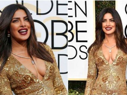 రాల్ఫ్ లారెన్ గౌన్ లో క్లీవేజ్ షో : అవార్ద్ ఫక్షన్ ని ఇలా తనవైపుకు తిప్పుకుంది 