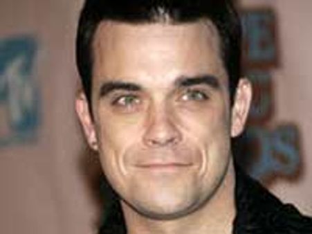 ब्रिटेन लौटे रॉबी विलियम्स