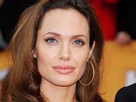 जोली ने एनिस्‍टन को धमकाया