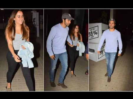 MOVIE DATE..देर रात गर्लफ्रेंड के हाथों मे हाथ डाले कैमरे में कैद हुए वरुण धवन...देखें तस्वीरें..