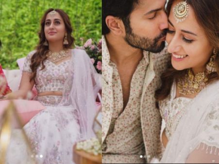 वरुण धवन ने शेयर की नताशा दलाल के साथ मेंहदी सेरेमनी की PHOTOS, पत्नी को KISS करते नजर आए