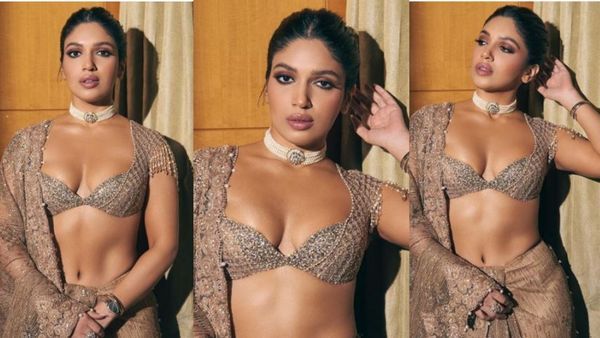 Sid-Kiara Reception साड़ी संग छोटा सा ब्लाउज फ्लॉन्ट करती नजर आईं भूमि, लोग बोले,अपने साइज का ब्लाउज नहीं मिला