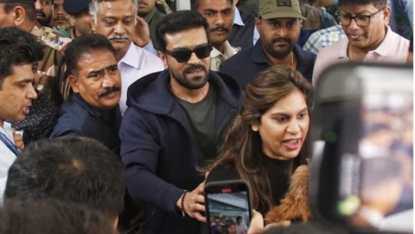 भारत लौटे राम चरण के स्वागत में जुटी भारी भीड़, प्रेग्नेंट पत्नी को बचाते दिखे एक्टर