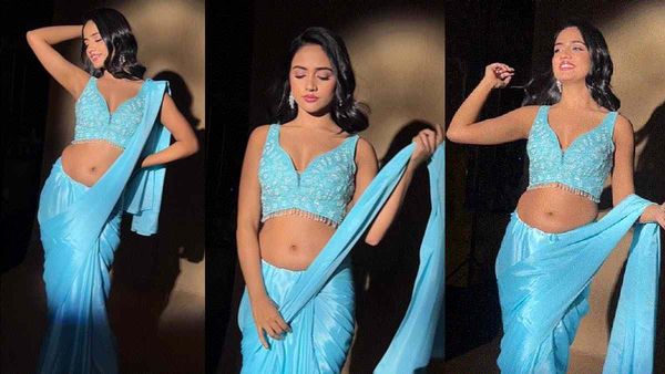 Nisha Guragain- ब्लू साड़ी पहनकर गिरा दिया पल्लू, हॉट फिगर देख बोले लोग- 'कुछ तो छोड़ दो'