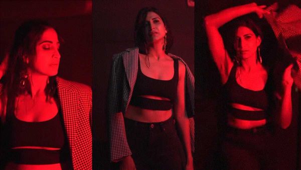 कंधे पर लटके ब्लेजर को उतारकर दिखाई ब्लैक ब्रालेट, रेड लाइट में मदहोश हुई ये एक्ट्रेस!