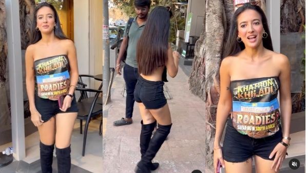 ये कैसा खतरा मोल लेकर निकली हसीना, बदन पर चिपकाए ऐसे-ऐसे बैनर और...