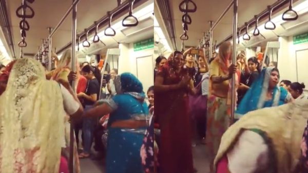Delhi Metro Video: देसी आंटियां गांव से आकर मेट्रो में लगीं नाचने, घूंघट ओढ़कर एक आंटी ने किया पोल डांस