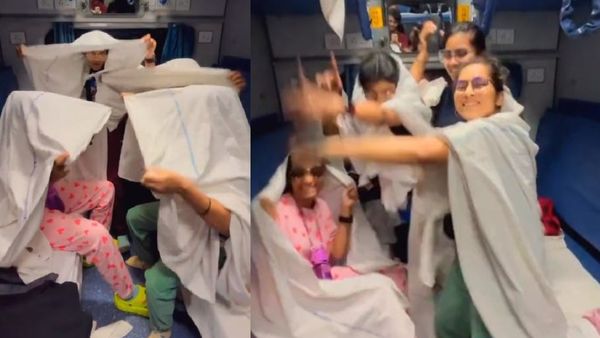 तेरे इश्क में नाचेंगे.. चलती ट्रेन में चादर ओढ़कर नाचीं लड़कियां, पानी की बोतल में वोडका वाला मजा!